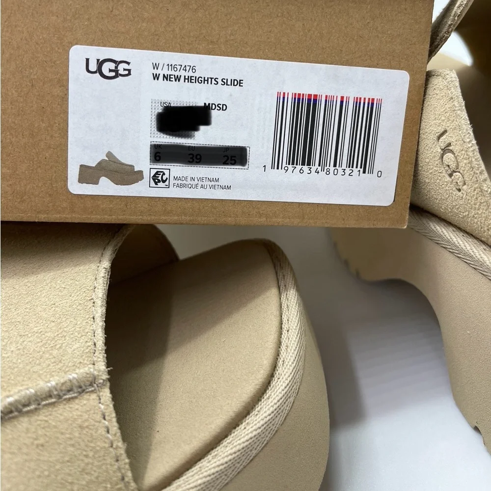 UGG Tan Platform Slide Sandals UGG
W / 1167476
W NEW HEIGHTS SLIDE MDSD
Mustard - Picture 16 of 16